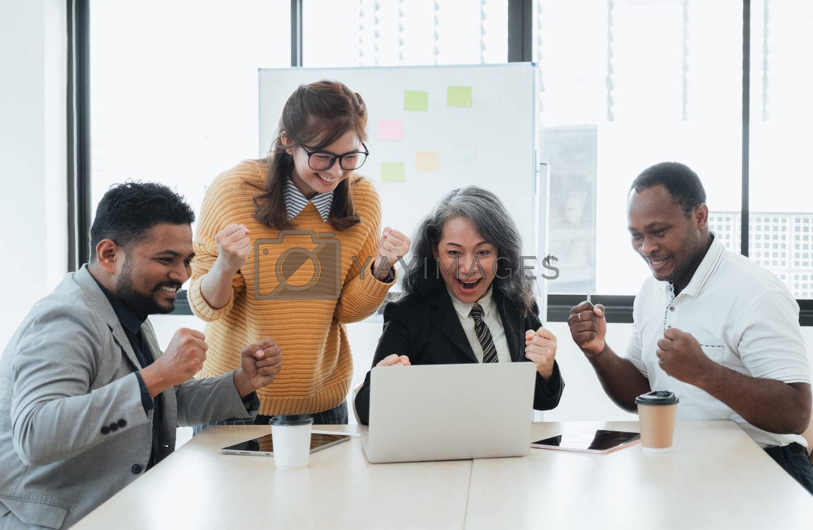 Royalty free image of Successful entrepreneurs and business people of various ethnicity achieve their goals. Feeling happy and victorious by wichayada