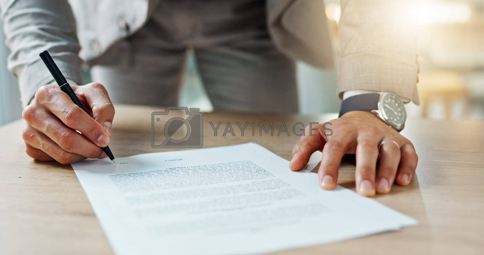 Royalty free image of Closeup, hands and business man with documents, writing and signature with planning, review and feedback. Zoom, person and employee with paperwork, lawyer or legal contract with letter, policy or pen by YuriArcurs