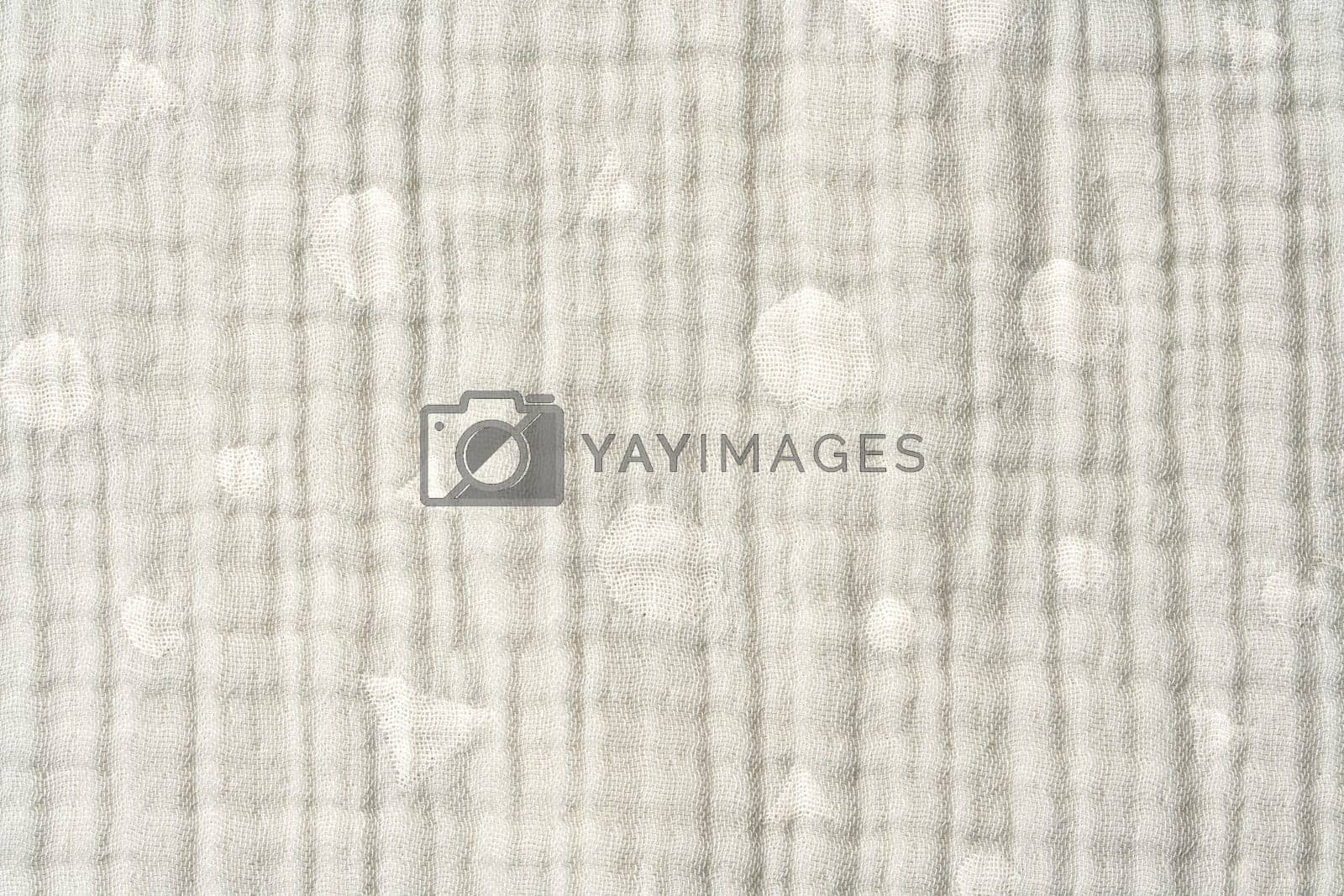 Royalty free image of Close up of muslin blanket texture background by Fabrikasimf
