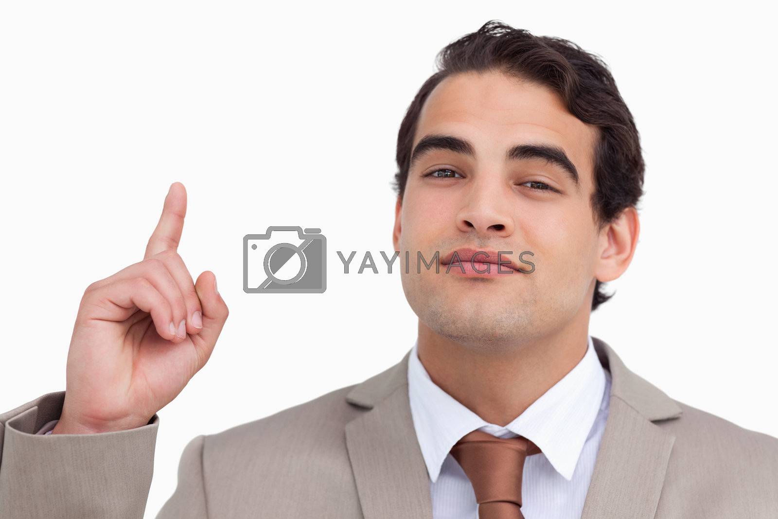 Royalty free image of Close up of salesman pointing up by Wavebreakmedia