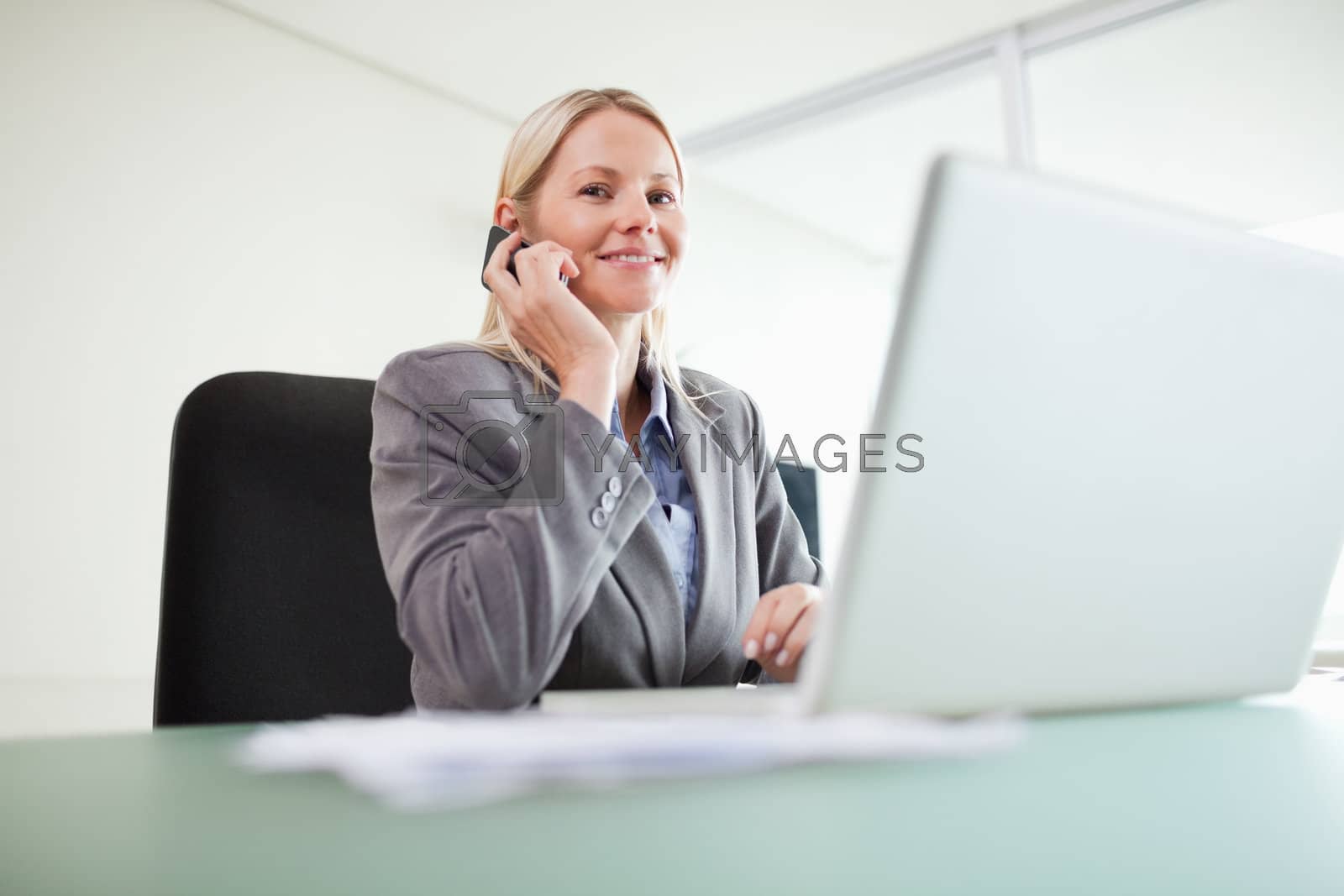 Royalty free image of Smiling businesswoman on the phone by Wavebreakmedia