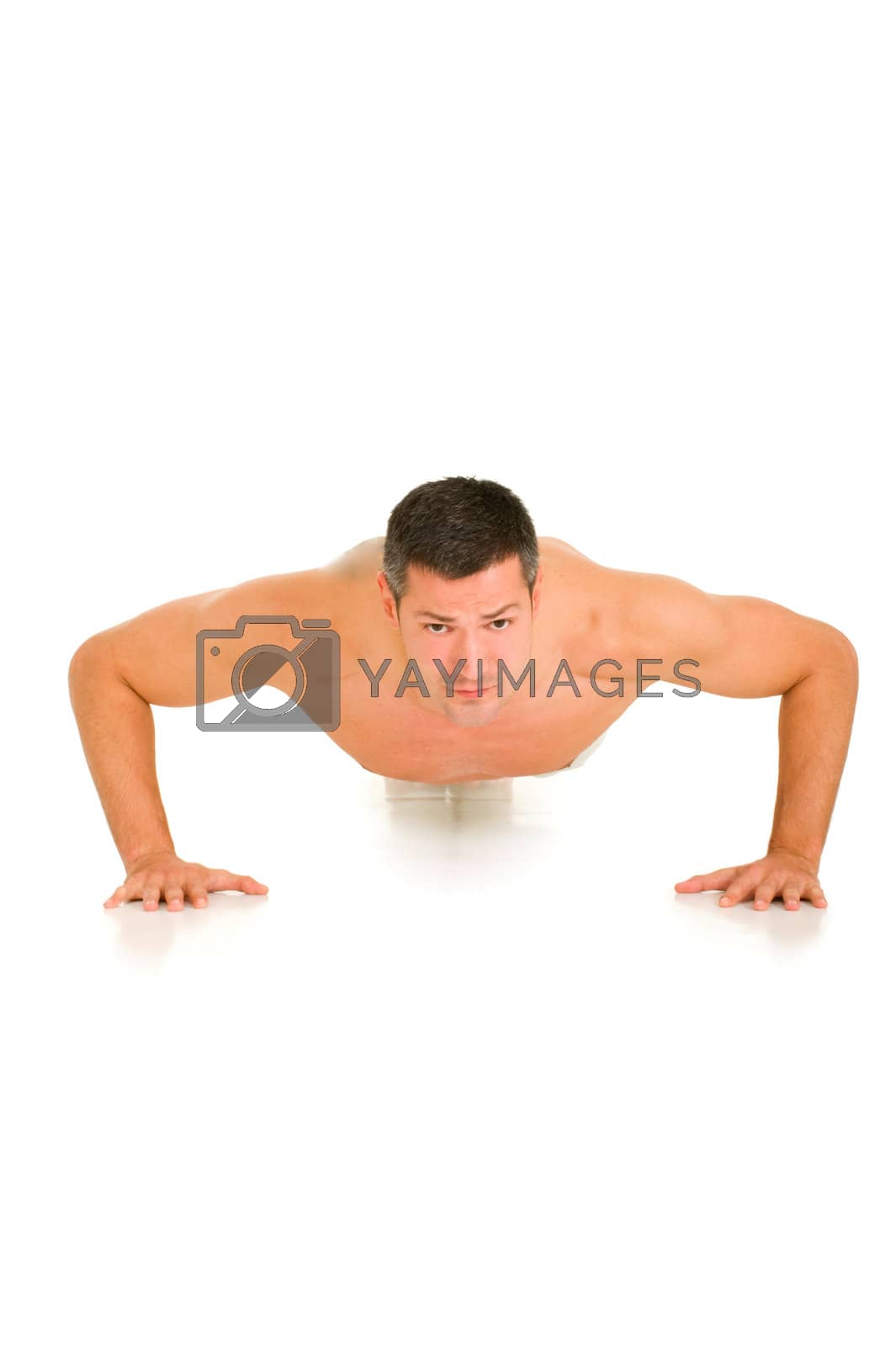 Royalty free image of bare-chested man does push-ups by ambro