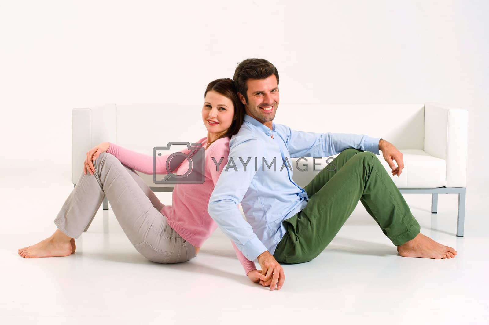 Royalty free image of couple back to back by ambro