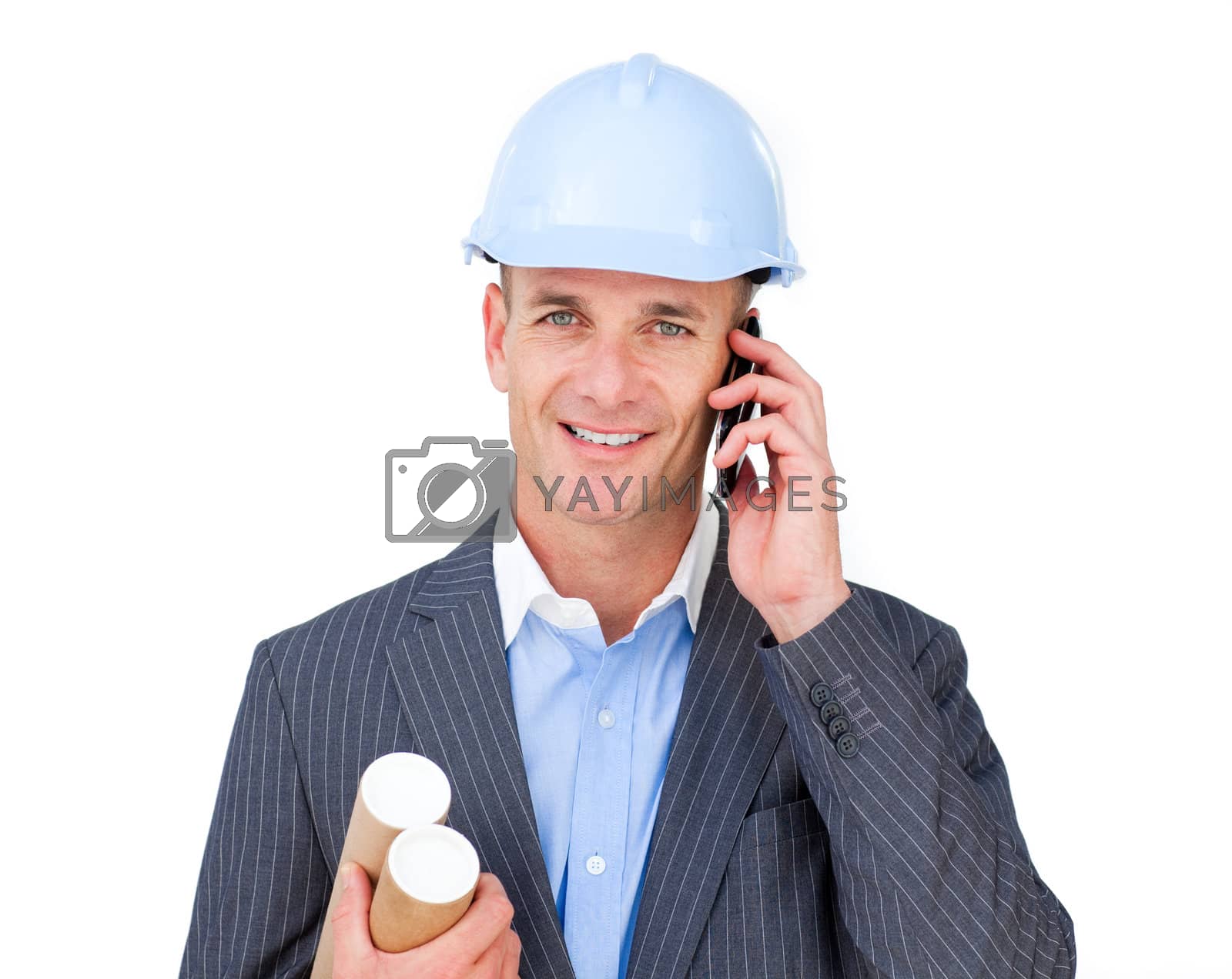 Royalty free image of Assertive male engineer talking on phone  by Wavebreakmedia