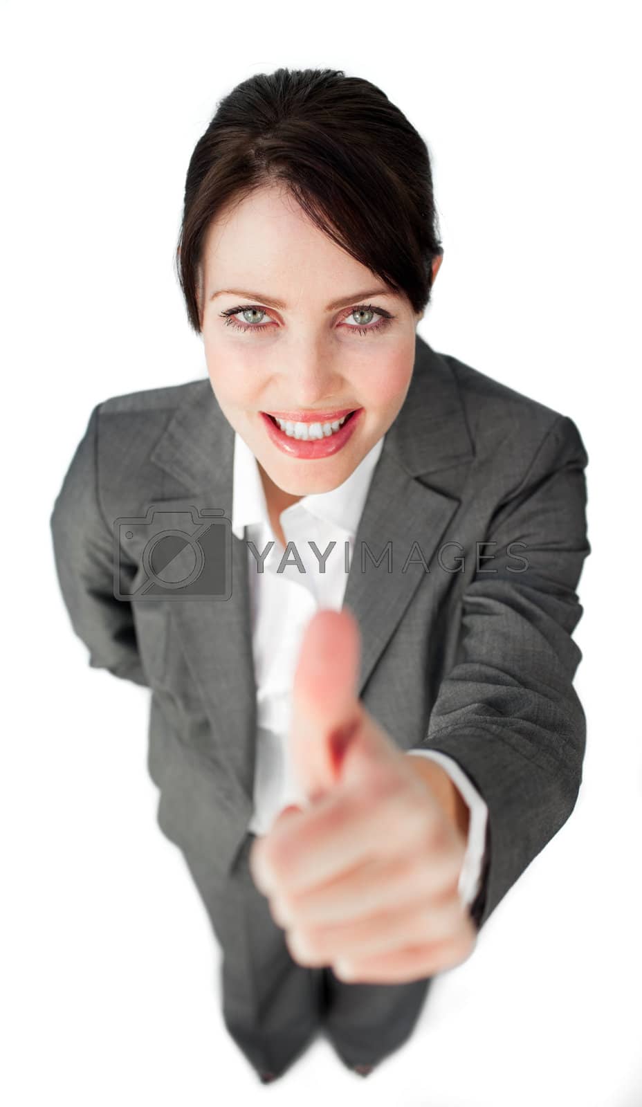 Royalty free image of Radiant businesswoman with thumb up  by Wavebreakmedia