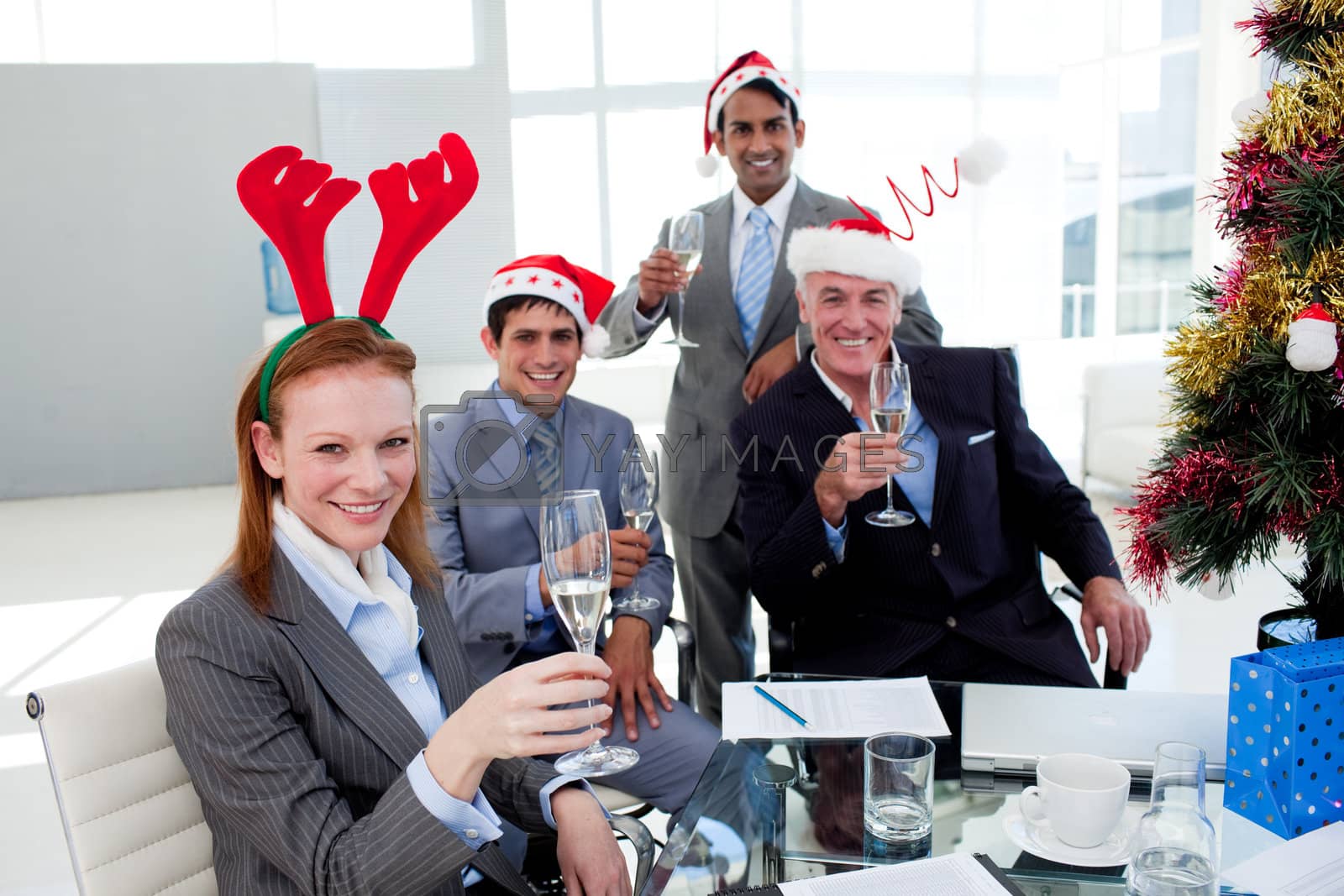 Royalty free image of Multi-ethnic busioness team toasting with Champagne at a Christm by Wavebreakmedia