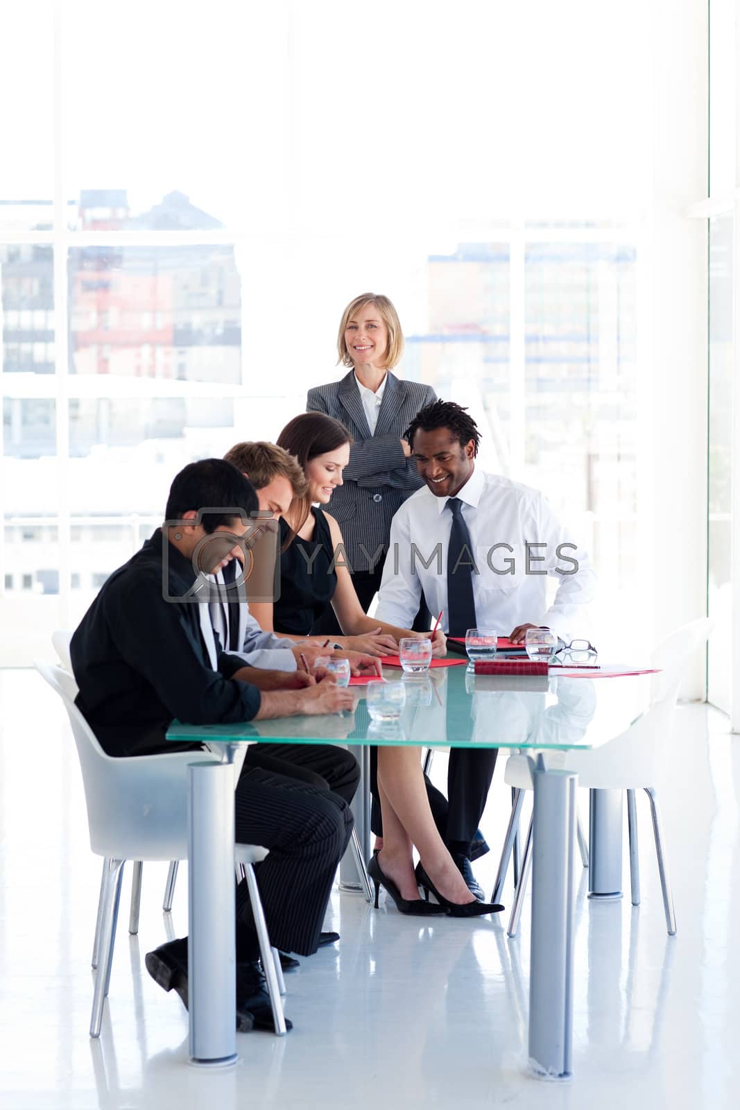 Royalty free image of Leadership with her team in a meeting by Wavebreakmedia