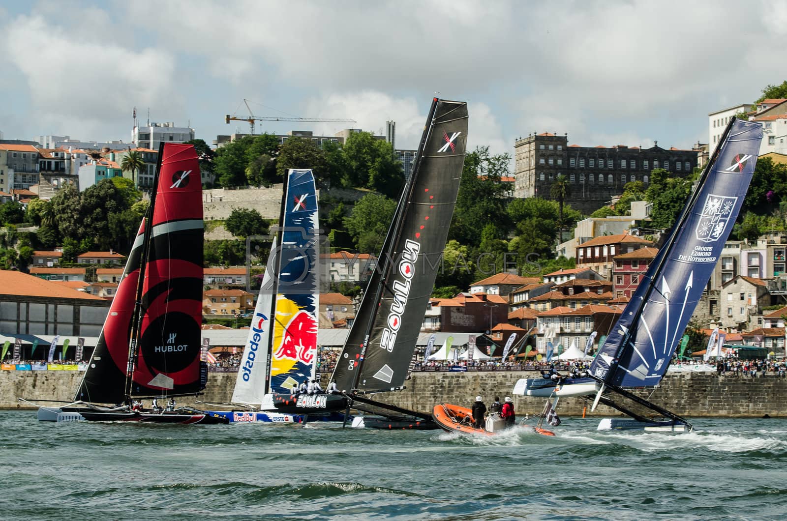 Royalty free image of Participants compete in the Extreme Sailing Series by homydesign
