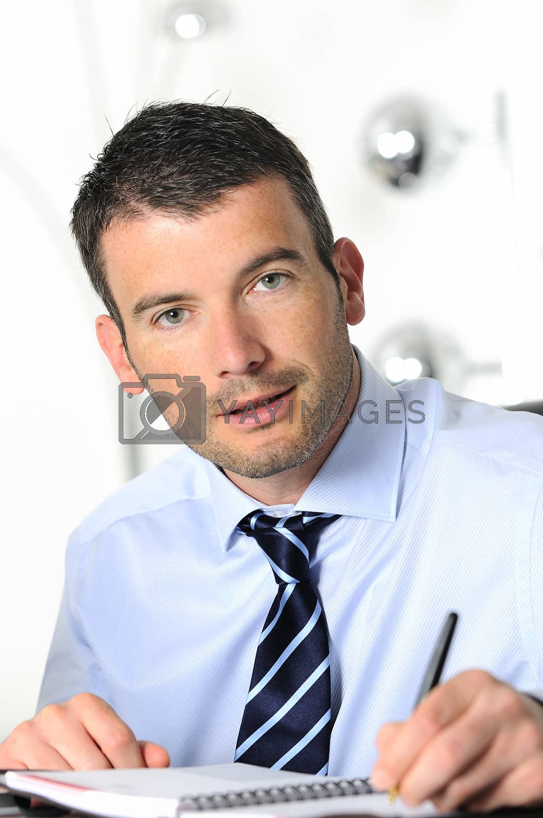 Royalty free image of serious businessman by ventdusud