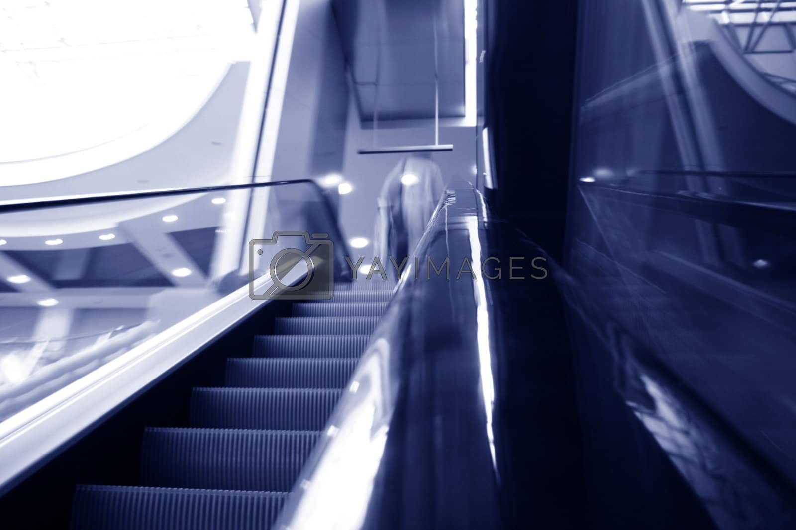 Royalty free image of blurred escalator by Yellowj