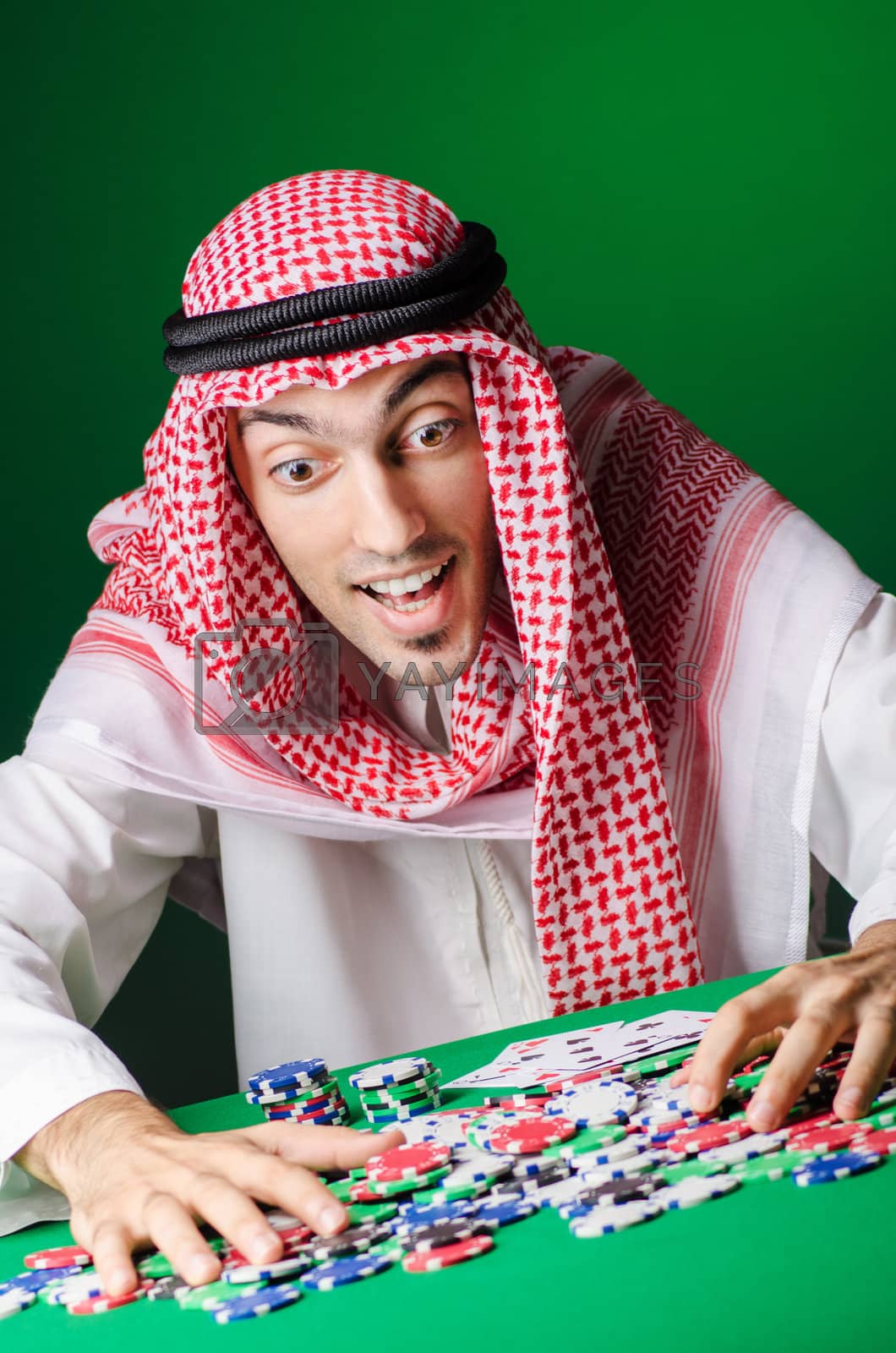 Royalty free image of Arab playing in casino - gambling concept with man by Elnur