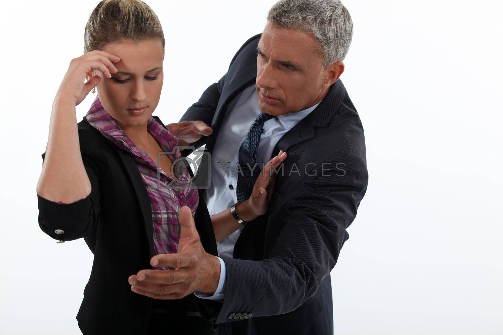 Royalty free image of businessman and businesswoman having a quarrel by phovoir