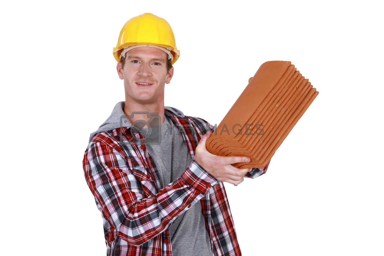 Royalty free image of Tile worker with battery by phovoir