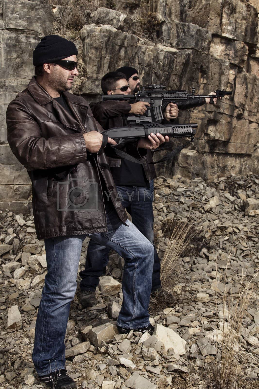 Royalty free image of gang members with guns by membio