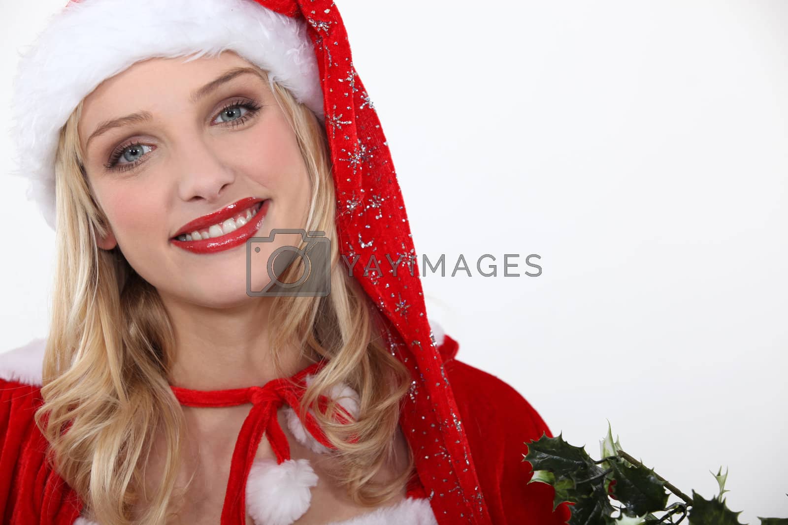 Royalty free image of Young blond woman wearing Christmas disguise by phovoir