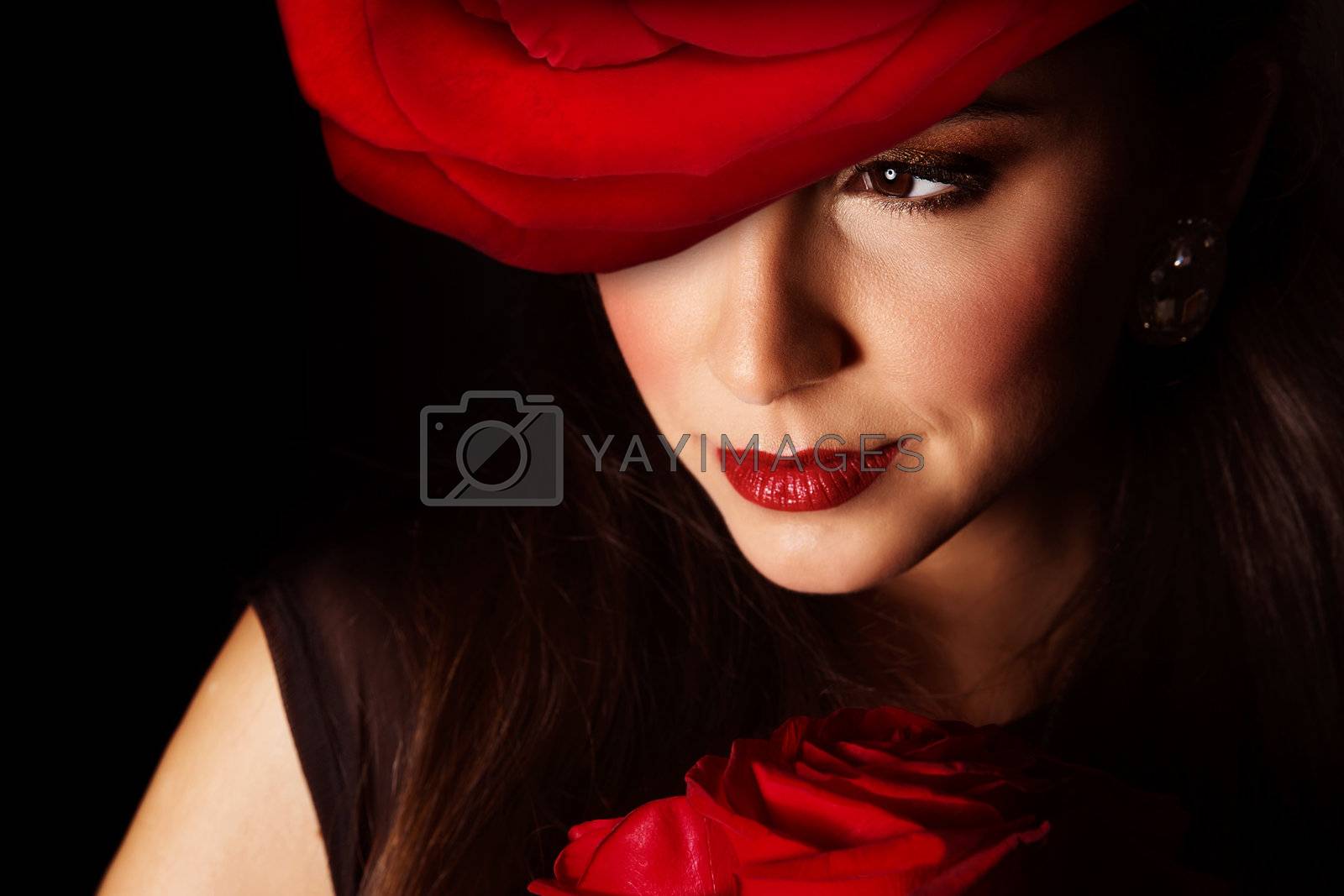 Royalty free image of Woman with red rose by Anna_Omelchenko