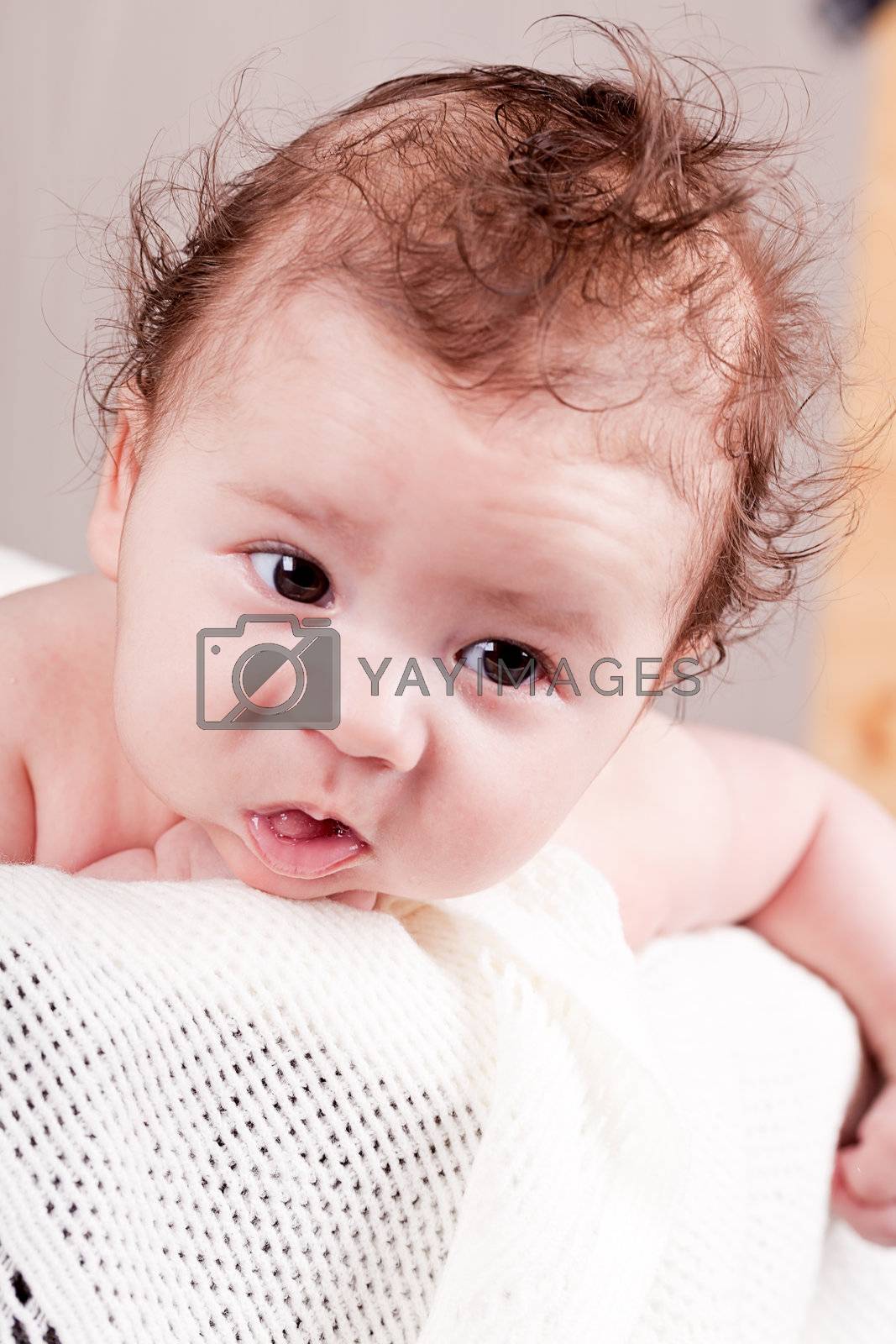 Royalty free image of sweet little baby infant toddler on blanket in basket by juniart