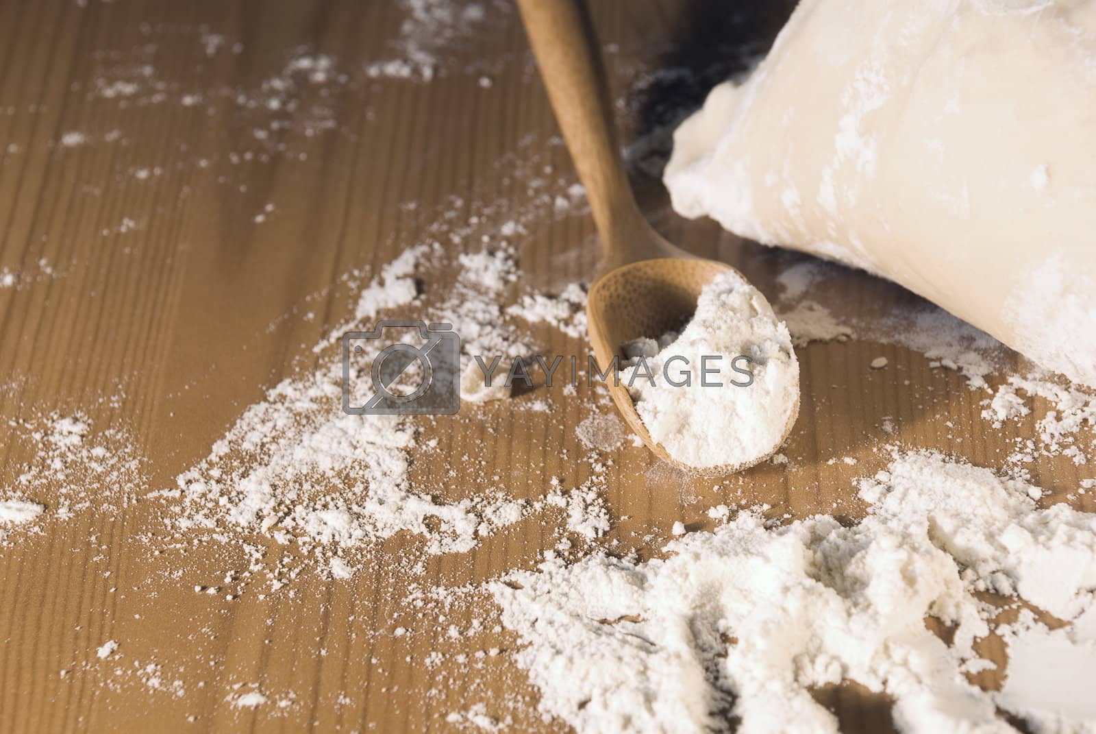 Royalty free image of rolling pin and flour by jannyjus