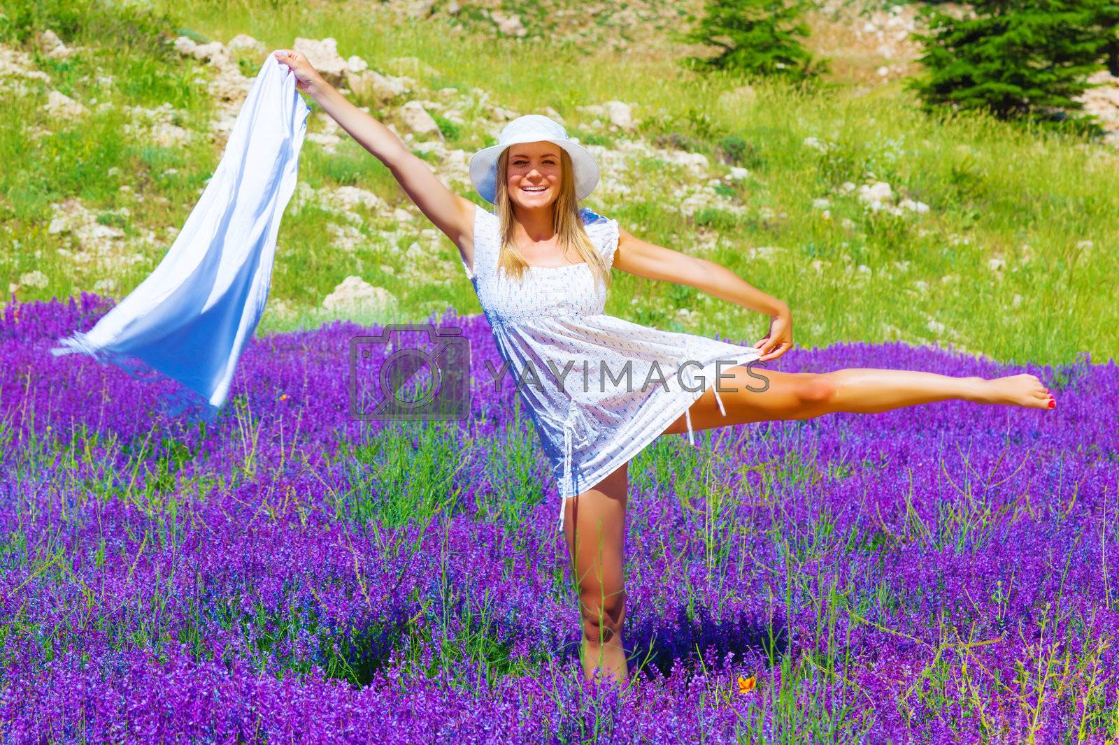 Royalty free image of Female dance on lavender meadow by Anna_Omelchenko