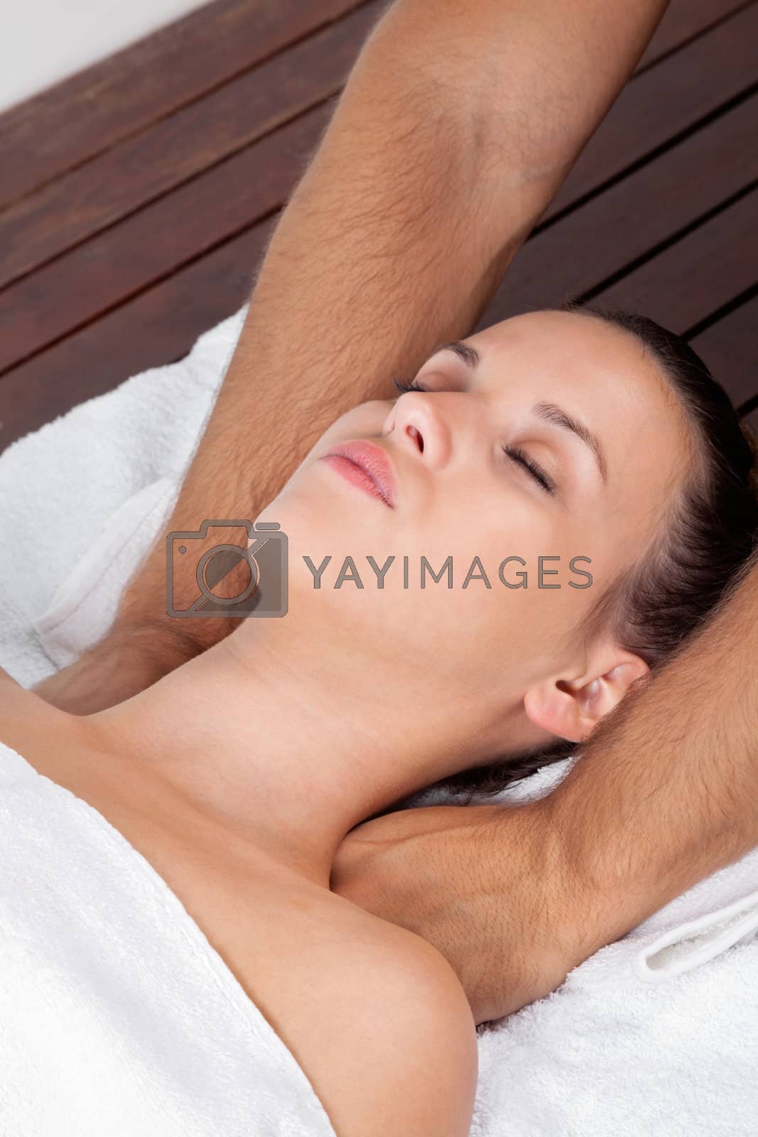 Royalty free image of Young Woman At Health Spa by leaf