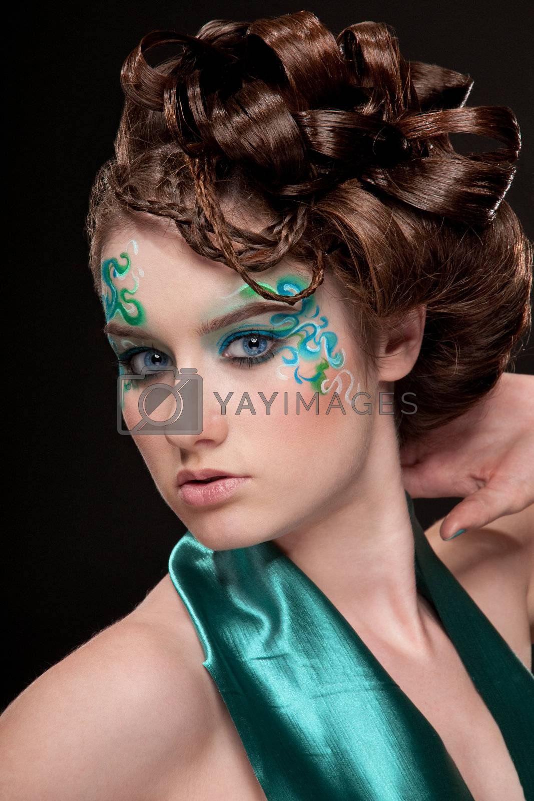 Royalty free image of Close-up portrait of sprite girl with faceart by markin