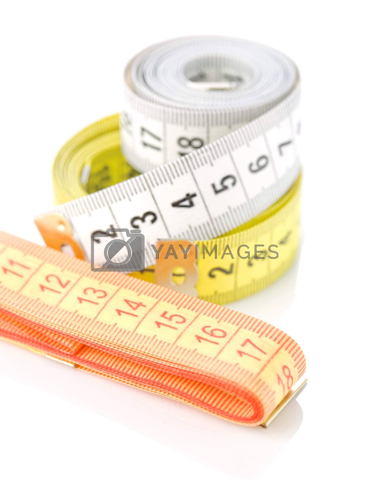 Royalty free image of measuring tapes by mihalec