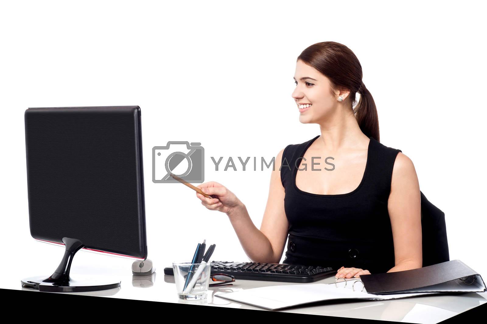 Royalty free image of Female assistant at her work desk by stockyimages