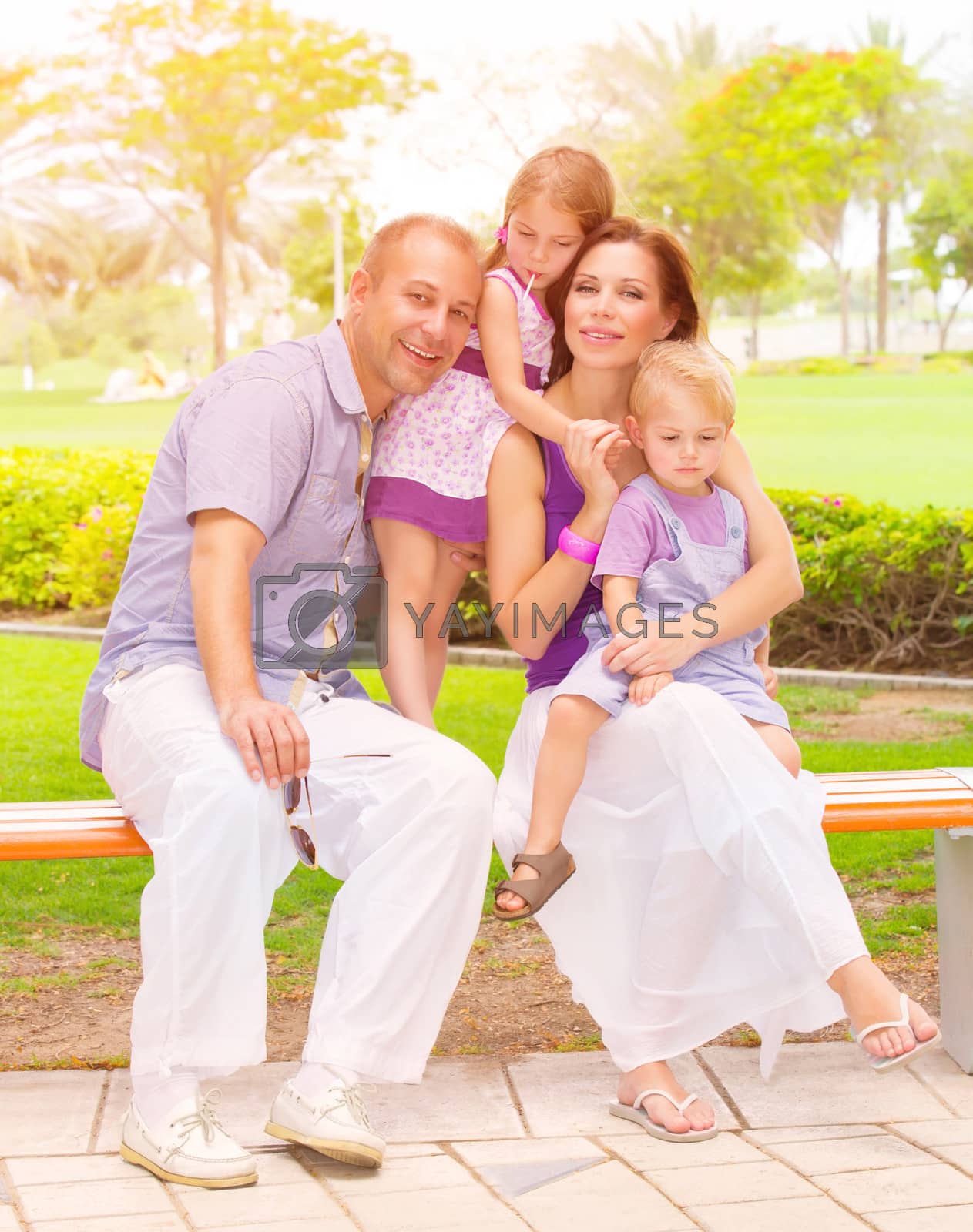 Royalty free image of Cute family in the park by Anna_Omelchenko