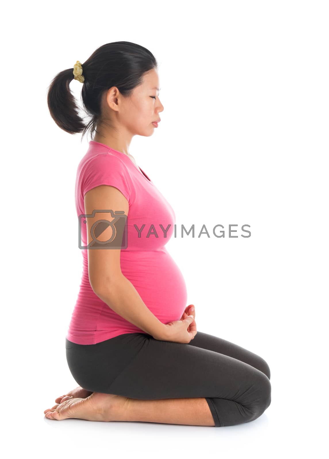 Royalty free image of Pregnant woman meditation by szefei