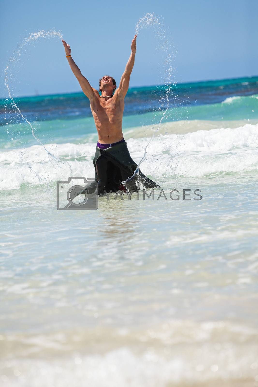 Royalty free image of attractive careree happy man in water holiday vacation summer by juniart