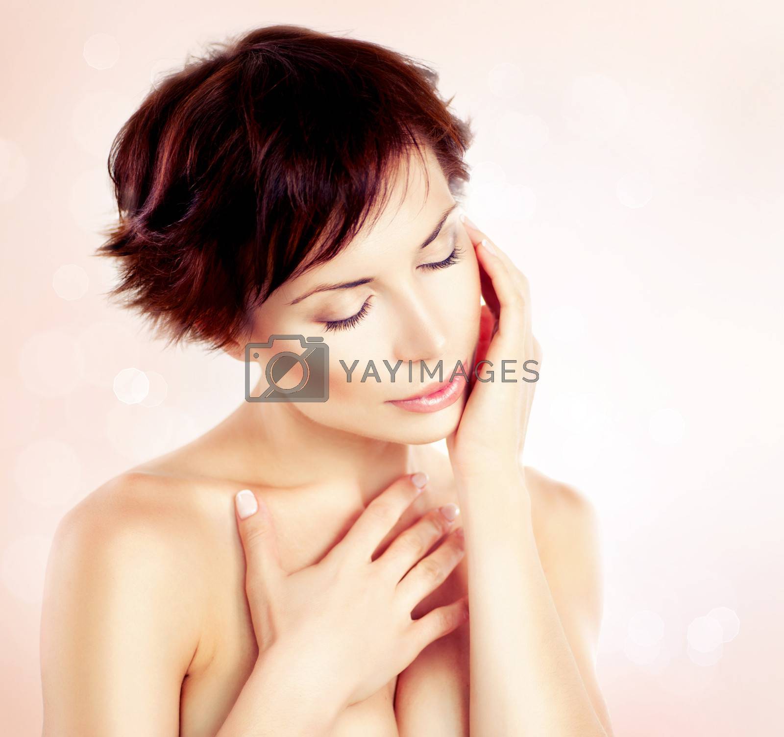 Royalty free image of Beautiful Young Woman touching her Face. Skincare  by SubbotinaA