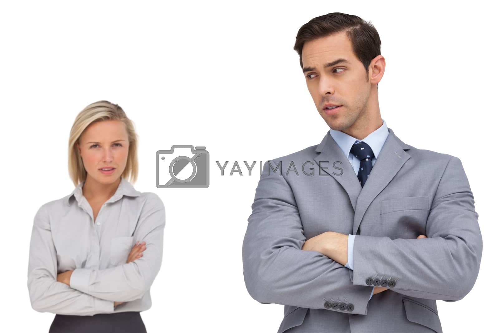 Royalty free image of Business people standing together showing rivalry by Wavebreakmedia