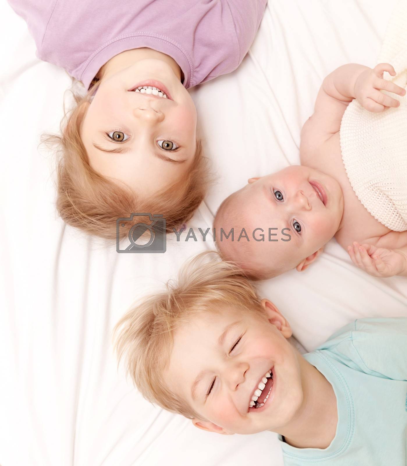 Royalty free image of Happy children at home by Anna_Omelchenko