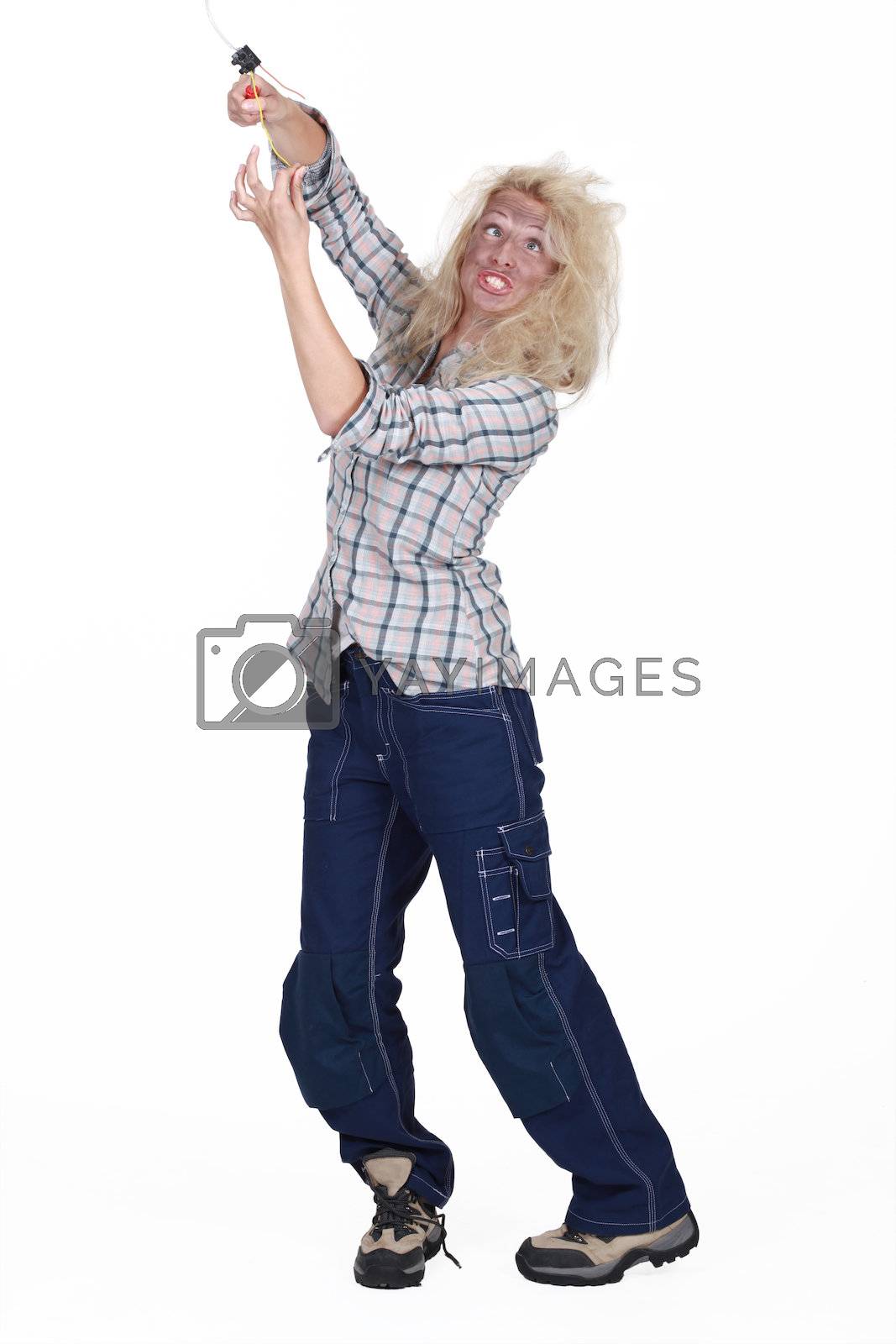 Royalty free image of Electrocuted woman by phovoir