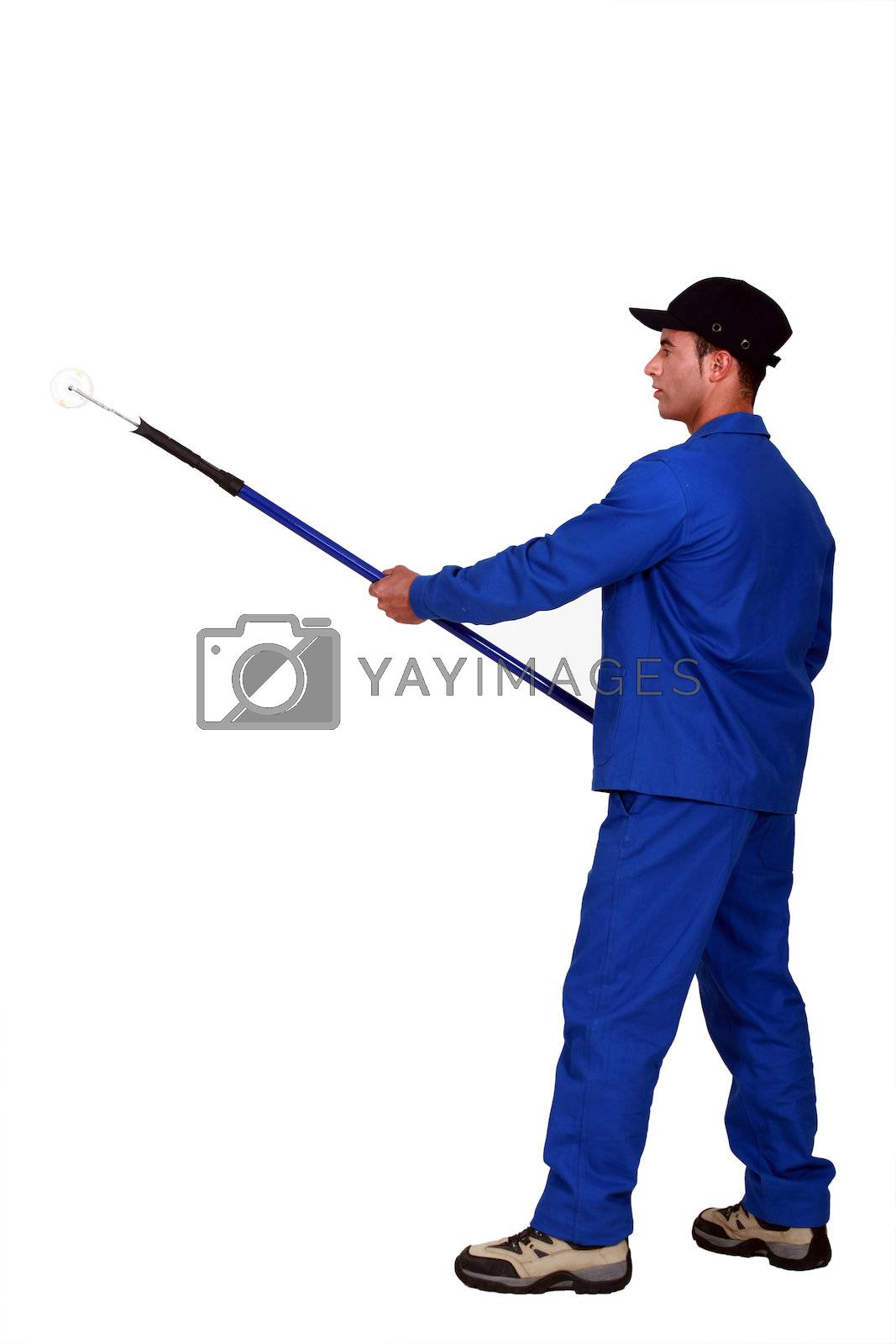 Royalty free image of A male painter with a roller. by phovoir