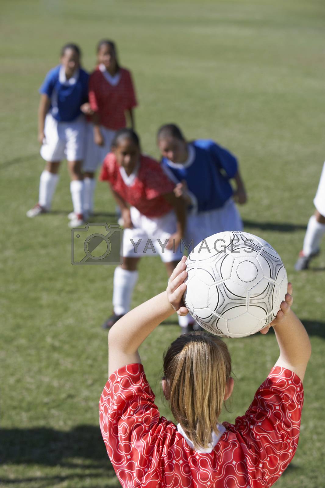 Royalty free image of Girls Playing Soccer by moodboard