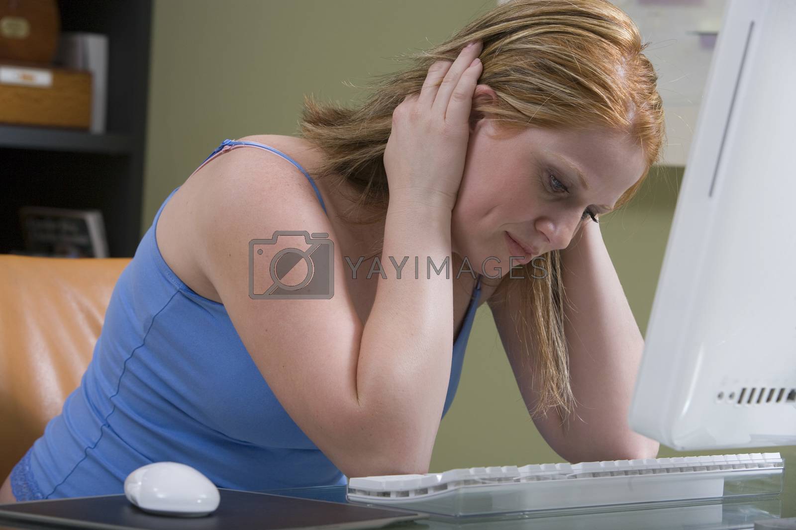 Royalty free image of Woman Using a Computer by moodboard