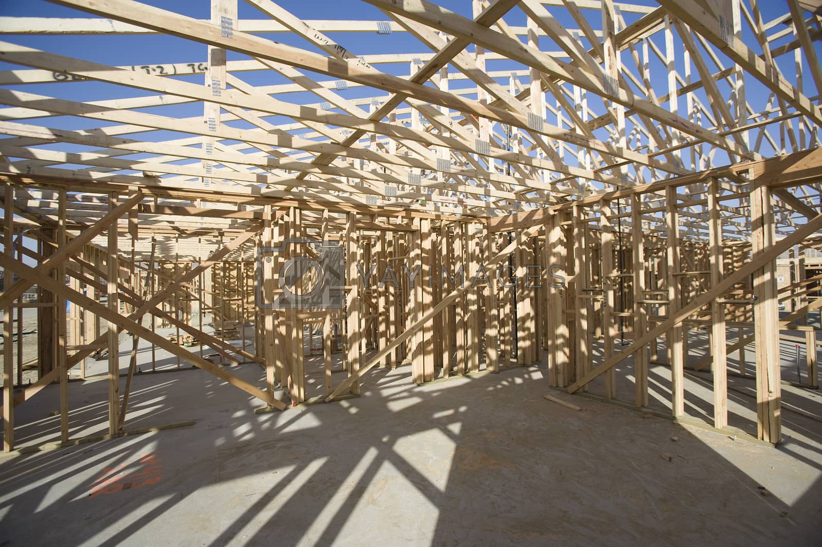 Royalty free image of Framework of a house under construction by moodboard