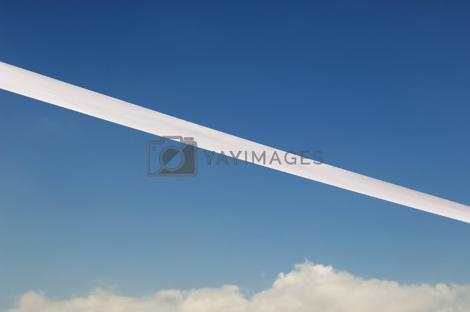 Royalty free image of Low angle view of finishing line against sky by moodboard