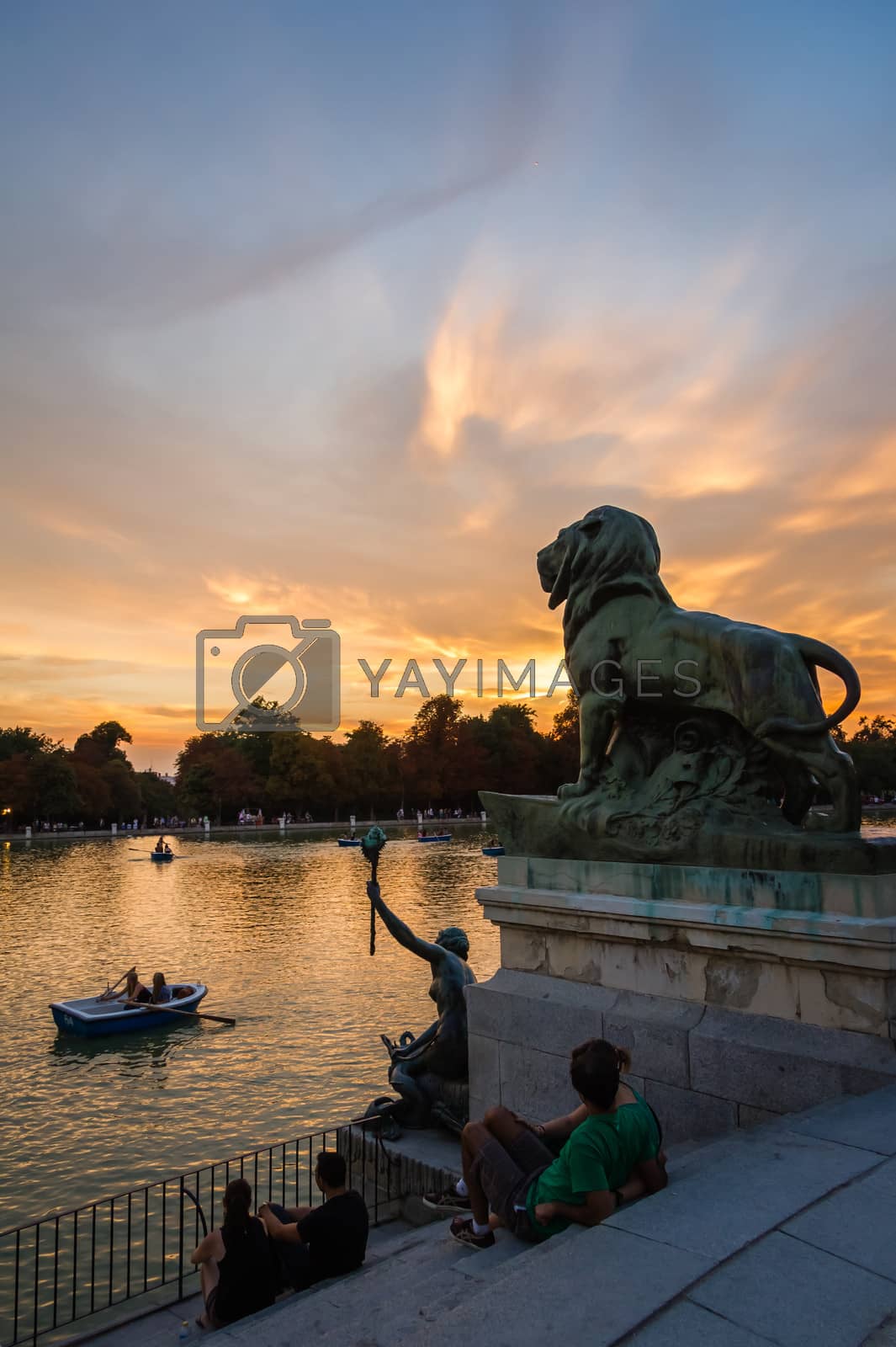 Royalty free image of Lion sculpture in Buen Retiro park lake, Madrid by doble.d