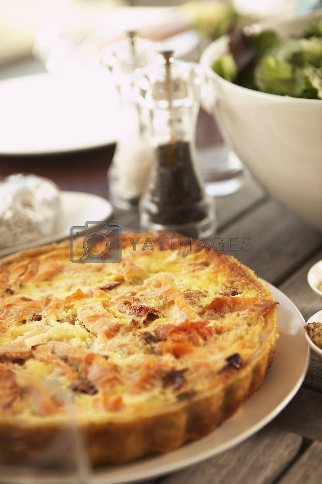 Royalty free image of Closeup of delicious quiche ready to eat by moodboard
