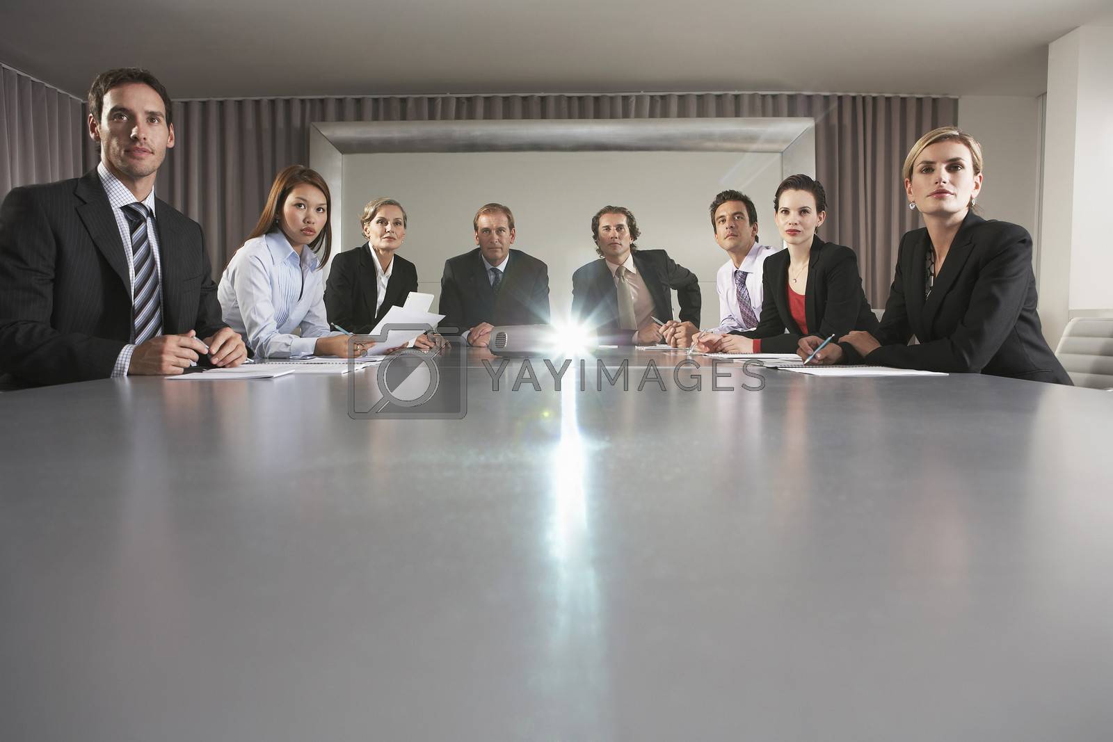 Royalty free image of Businesspeople Watching Presentation in Conference Room by moodboard