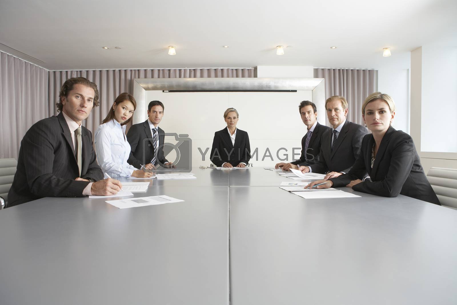 Royalty free image of Group of multiethnic business people at conference table by moodboard