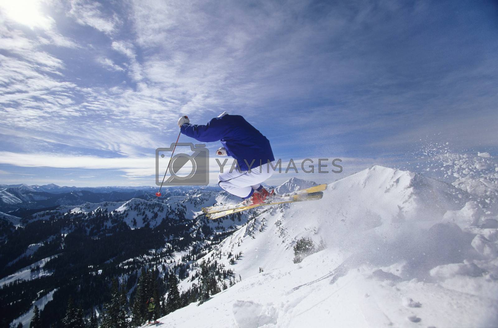 Royalty free image of Skier jumping on mountain top Hitting the Slopes by moodboard