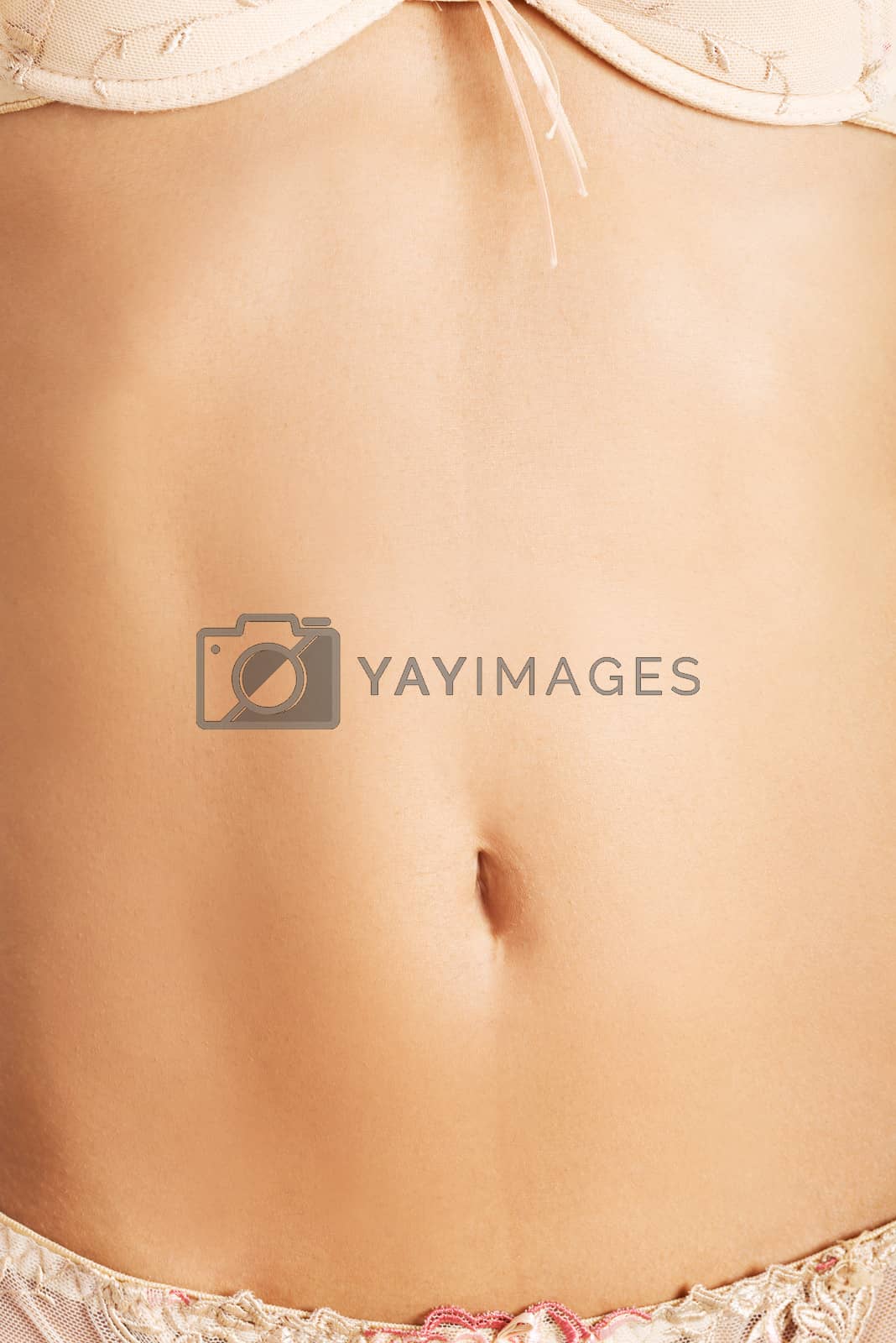 Royalty free image of Fit and slim woman belly by BDS