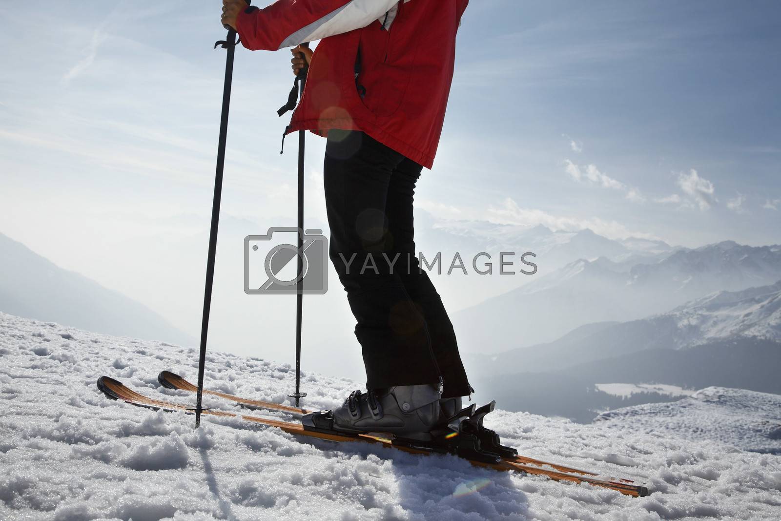 Royalty free image of Skier in mountains low section by moodboard