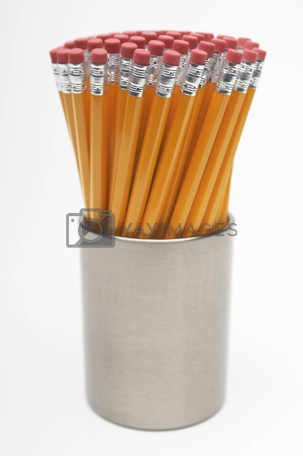 Royalty free image of New pencils in container isolated over white background by moodboard