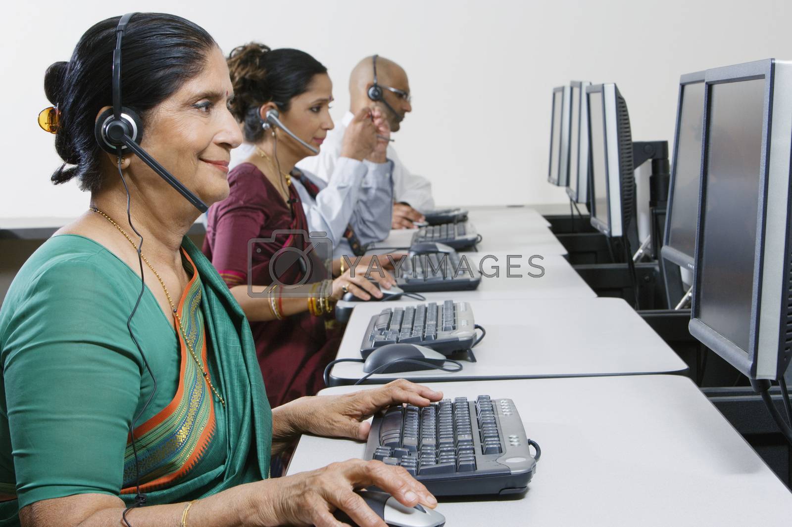 Royalty free image of Customer Service Reps in Call Center by moodboard