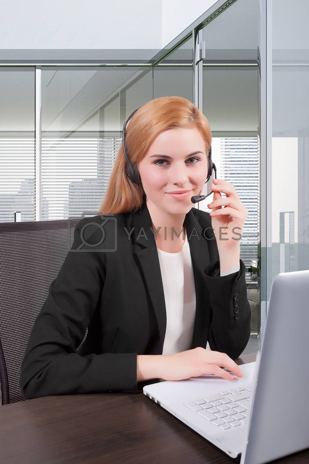 Royalty free image of Businesswoman customer service by matteobragaglio