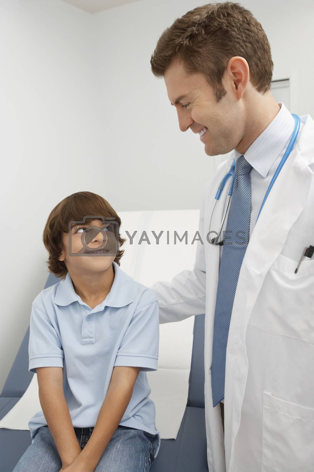 Royalty free image of Doctor and young patient by moodboard
